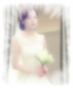 gif of Sun-Mi modeling wedding gowns